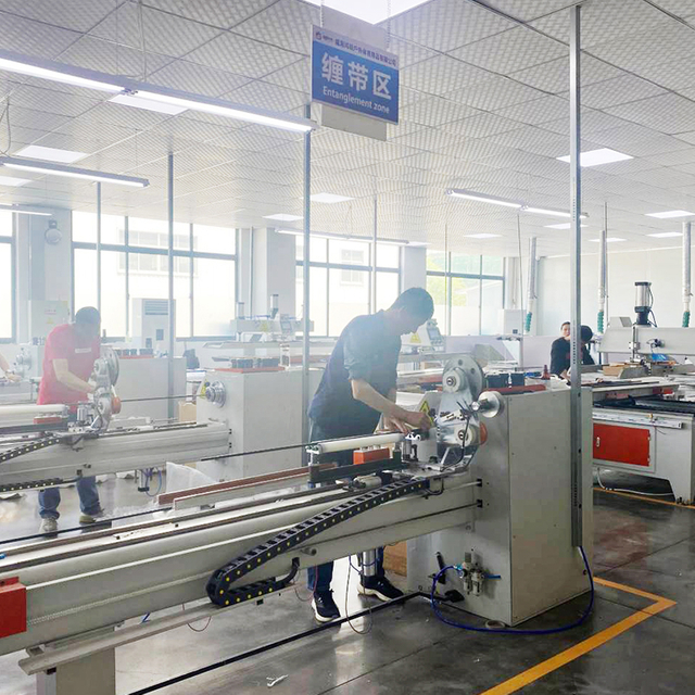 Manufacturing facility specializing in high-quality fishing rod combos, featuring advanced machinery for producing carbon fiber fishing rods and precision fishing reels.